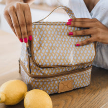 Load image into Gallery viewer, Thandana insulated thermal cooler with a brown and blue print and lemons in the foreground.