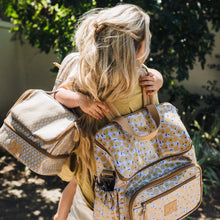 Load image into Gallery viewer, Thandana thermal cooler and backpack with mom and child hugging.