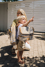 Load image into Gallery viewer, Little boy on his way to school with his Thandana lunch cooler bag - insulated and cute prints.