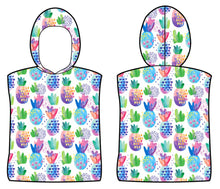 Load image into Gallery viewer, The Bobums Kids Hoodie Towel - Patterned Pines showcases vibrant pink, blue, green, and purple pineapples and abstract shapes on white. With front and back views, this fun yet practical beach essential combines a hooded garment with eye-catching design.