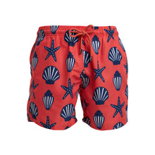 Load image into Gallery viewer, Breazies Kids Swim Shorts - Shells in orange feature a drawstring waist and navy starfish and shell prints. Made from quick-drying recycled polyester, these relaxed fit trunks are shown on a white background.