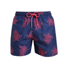 Load image into Gallery viewer, Breazies boys swim shorts with red turtles on a navy background - front view