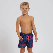 Load image into Gallery viewer, Breazies boys swim shorts with red turtles on a navy background - front view shown on a young boy
