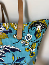 Load image into Gallery viewer, Binny Bag material tote/beach bag with florals and bright blue background
