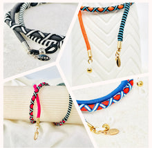 Load image into Gallery viewer, A collage showcases Sichri's colorful braided bracelets with metal clasps, including the Eyewear strap - Rhapsody Green/Red. These pieces incorporate black, white, orange, and blue patterns with gold accents and can also serve as unique eyewear straps. Artfully arranged against a neutral backdrop.