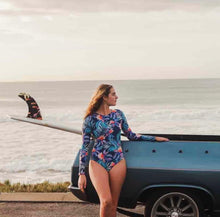 Load image into Gallery viewer, Lady with surfboard, Lapis Blue Flowers and leaves, Long Sleeve one piece, swimwear from Surf Sense, South Africa