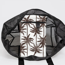 Load image into Gallery viewer, The Thandana Large Black Mesh Beach Bag - Palms reveals its interior from above, showcasing a waterproof sleeve with brown palm trees on a white background. Made from water-resistant mesh fabric, it protects your essentials.