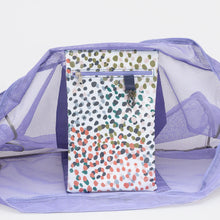 Load image into Gallery viewer, The Thandana Large Lilac Meshie Beach Bag - Confetti has a colorful dotted inner bag with a top zipper, made from water-resistant fabric. Its open purple mesh design filters sand easily, and both bags rest on a crisp white background.