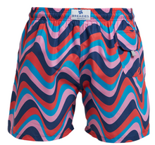 Load image into Gallery viewer, Breazies Matching Retro Swimwear: Men's trunks with a wavy red, blue, pink, and navy pattern. Made from recycled polyester with an elastic waistband, back flap pocket, and "BREAZIES" label at the waist.