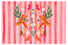 Load image into Gallery viewer, The "Parrot Paradise" sarong by Natural Selection features colorful illustrations of two roosters and parrots, encircled by vibrant flowers and leaves. Set against vertical pink and red stripes, the festive design is symmetrical, reminiscent of a lively sarong aesthetic. Comes with a matching wet bag.