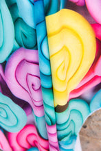 Load image into Gallery viewer, Close up of Bobums UAE Microfibre beach towel with Sorbet Snails design