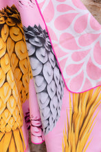 Load image into Gallery viewer, Close up of Bobums UAE Microfibre beach towel with Wild Pines design on double sided towel