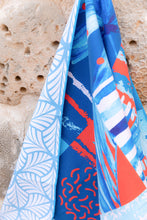 Load image into Gallery viewer, Microfibre towel with beach addict design and double sided pattern at Dubai Textile Souk