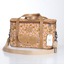 Load image into Gallery viewer, Thandana's Laminated Fabric Caddy Cooler in Gerry Pear Bloom is a stylish pink bag featuring a charming pear pattern and tan genuine leather trim. It includes a front flap pocket, tan shoulder strap, and two short handles. The design adds convenience with it's insulated cooler functionality.