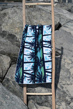 Load image into Gallery viewer, Bobums UAE Microfibre beach towel with Blue Palms Kids design on ladder