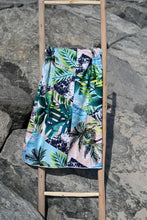 Load image into Gallery viewer, Bobums UAE Microfibre beach towel with Geo Palm design on ladder