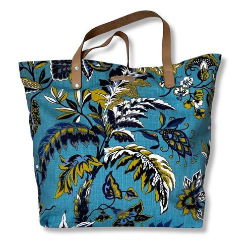 Binny Bag material tote/beach bag with florals and bright blue background - full image