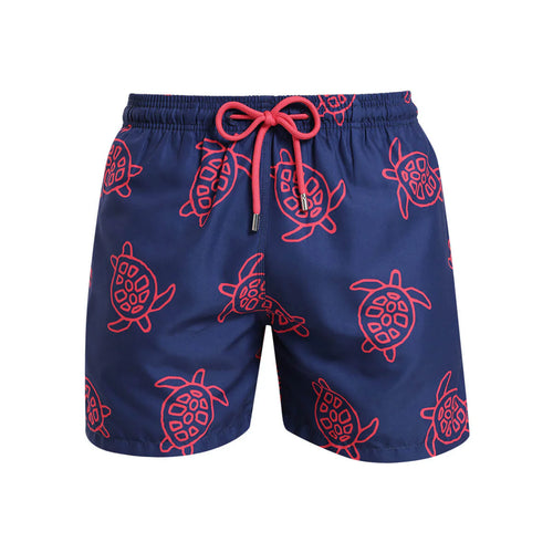 Breazies boys swim shorts with red turtles on a navy background - front view