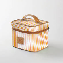 Load image into Gallery viewer, A striped Thandana mini deck insulated cooler bag in pink, orange, and white with a leather handle and gunmetal zipper.
