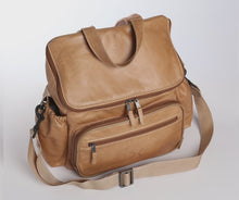 Load and play video in Gallery viewer, Stylish and practical Thandana leather nappy backpack with changing mat, bottle holders, and genuine leather trims, made in South Africa.
