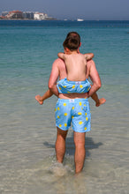 Load image into Gallery viewer, Kids Swim Shorts - Pineapples | Baby Blue
