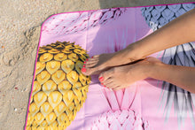 Load image into Gallery viewer, Feet on Bobums UAE Microfibre beach towel with Wild Pines design on double sided towel
