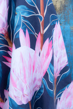 Load image into Gallery viewer, Close up of Bobums UAE Microfibre beach towel with Pink Protea design on double sided towel
