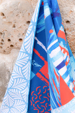 Load image into Gallery viewer, Microfibre towel with beach addict design and double sided pattern at Dubai Textile Souk
