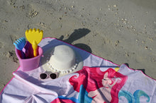 Load image into Gallery viewer, Bobums UAE Microfibre beach towel with Sitting Mermaid kids design on beach sand with hat, sunglasses and beach toys
