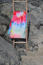 Load image into Gallery viewer, Bobums UAE Microfibre beach towel with Tie Dye Swirl design on ladder at the beach
