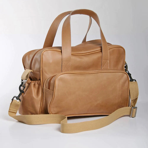 Luxury hazelnut leather baby bag by Thandana—travel-ready nappy bag with spacious compartments, handmade in South Africa