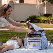 Load image into Gallery viewer, Mum enjoying park picnic with her baby, Thandana diaper bag close by for stylish parenting on the go
